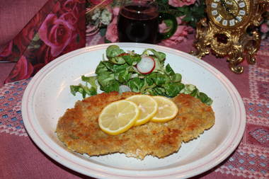 Kalbschnitzel  paniert mit Parmesankäse